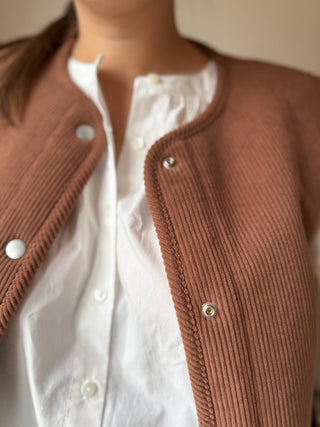 Veste sans manches réversible en velours côtelé et bouclette